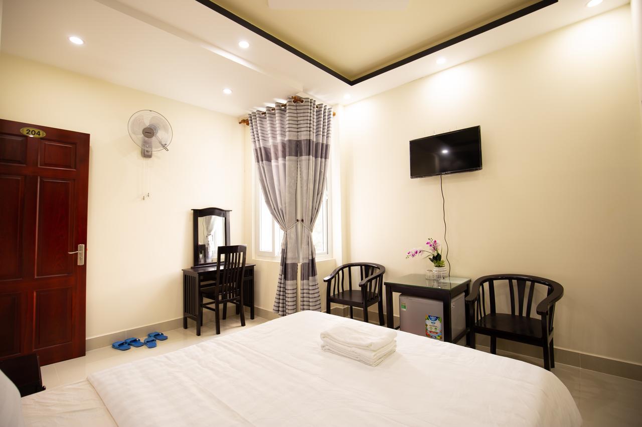 An Phat Hotel Chi Khu Co Ong ภายนอก รูปภาพ