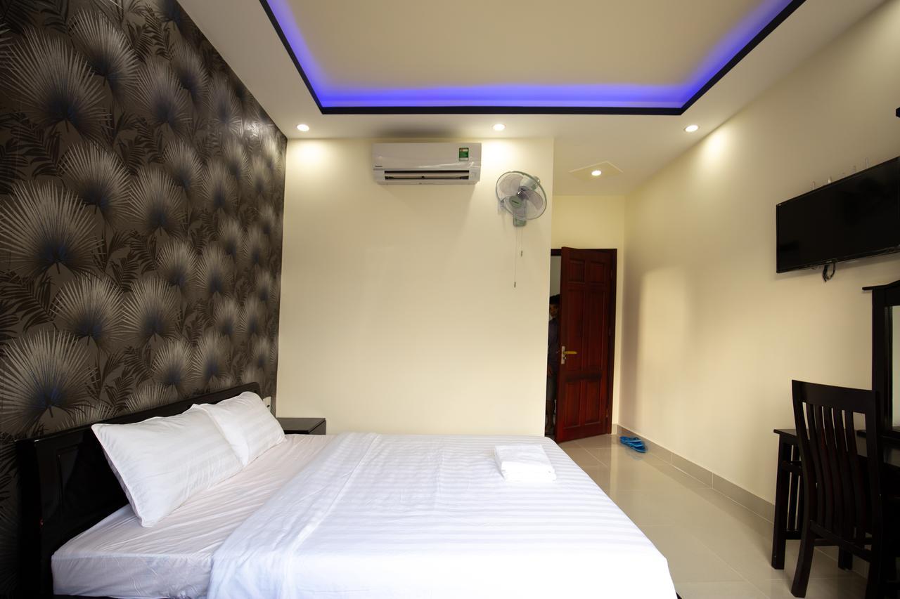 An Phat Hotel Chi Khu Co Ong ภายนอก รูปภาพ